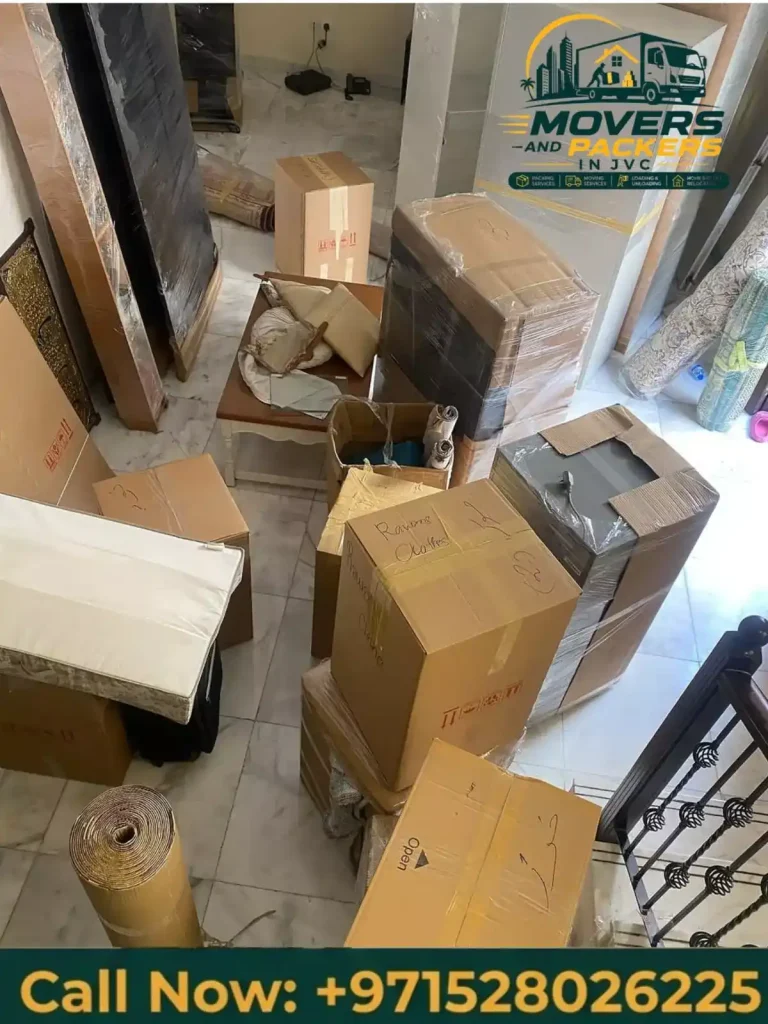 Labelled moving boxes ready for apartment relocation