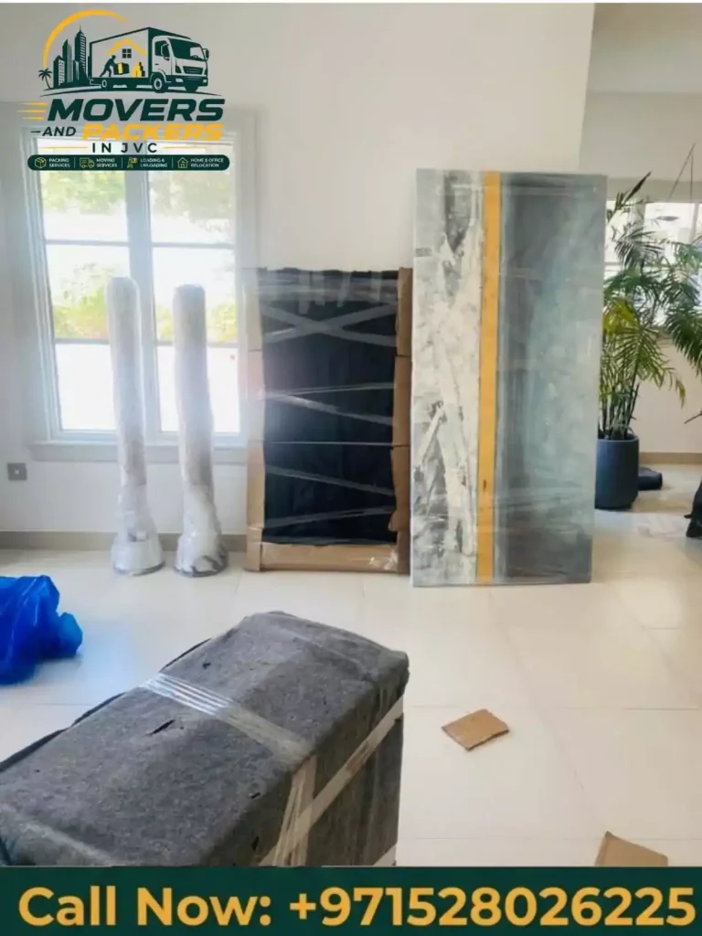 Professional movers transporting a piano safely